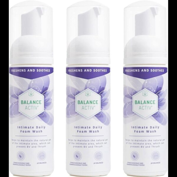 The product image features a bottle of Balance Activ Intimate Daily Wash Foam. The bottle is white with a pump dispenser at the top, making it easy to dispense the foam. The label on the front of the bottle is predominantly blue and white, with the brand name "Balance Activ" prominently displayed at the top. Below the brand name, the product name "Intimate Daily Wash Foam" is written in clear, bold letters. The label also includes additional information about the product's benefits and usage instructions. The overall design of the bottle is clean and professional, emphasizing hygiene and care.